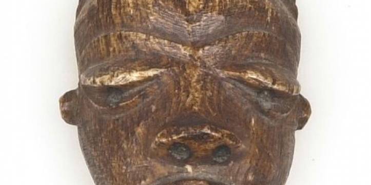 Liberisch masker uit het Tropenmuseum. Deze had een spirituele functie Ma GO masker uit Tropenmuseum