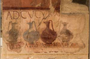 "Ad Cucumas" shop, ancient roman painting in Herculaneum, Italy.