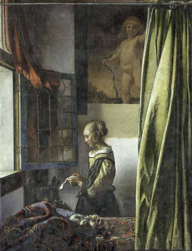 Het schilderij 'Het Meisje met brief bij open venster' van Vermeer is in het Zwinger weer in oude staat te zien.