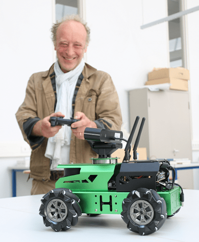 Mark Driessen test de robotauto in de facultaire Schervenzaal